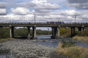 VLADIKAVKAZ, RUSSIA - OCTOBER 31, 2016: A tram on a bridge across the Terek River. Kirill Kukhmar/TASS Ðîññèÿ. Âëàäèêàâêàç. 31 îêòÿáðÿ 2016. Òðàìâàé åäåò ïî ìîñòó ÷åðåç Òåðåê. Êèðèëë Êóõìàðü/ÒÀÑÑ